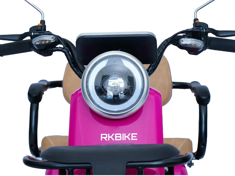 Close-up of the electric tricycle headlight, highlighting a bright LED design for enhanced visibility and safety during city commuting