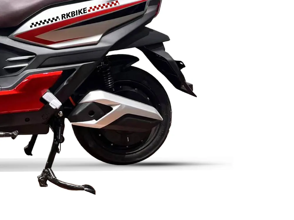 Close-up of electric scooter rear wheel showing durable tire, wheel hub, rear suspension, and brake disc