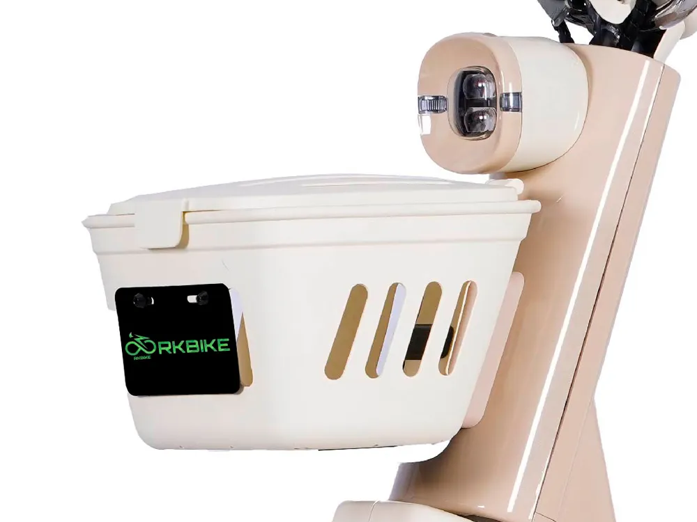 Close-up of beige electric scooter front basket and LED headlight, showing storage space and bright lighting for safe urban commuting