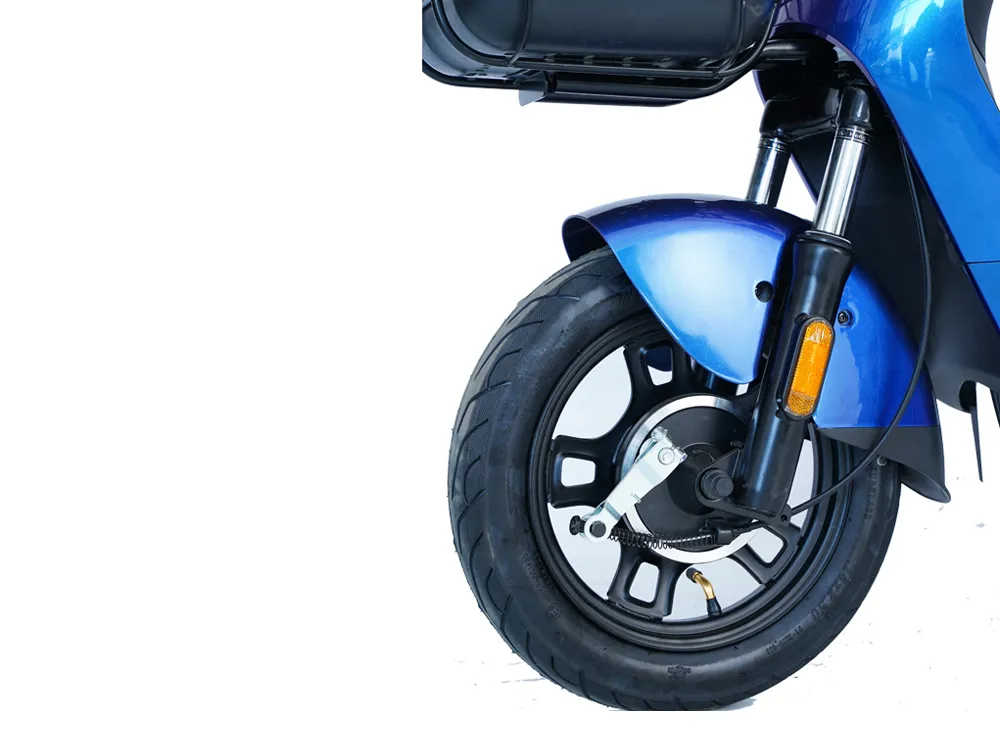 Close-up of a dark blue electric scooter’s front wheel, highlighting tire tread, disc brake, and hub for safe and stable city commuting