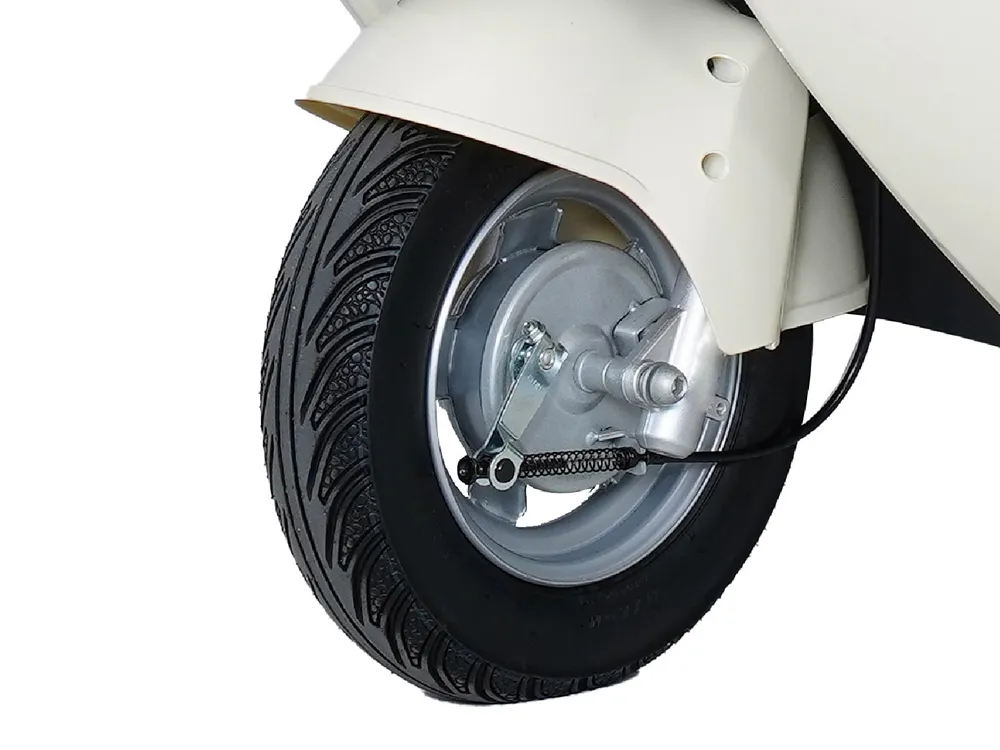 Close-up of the front wheel of an electric convertible tricycle, highlighting the durable tire, braking system, and suspension for enhanced safety and stable urban commuting