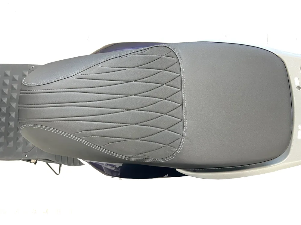 Close-up of electric scooter ergonomic seat cushion with anti-slip stitched design
